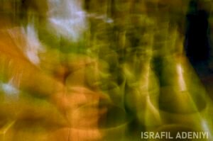 Hands and clay pots blurred