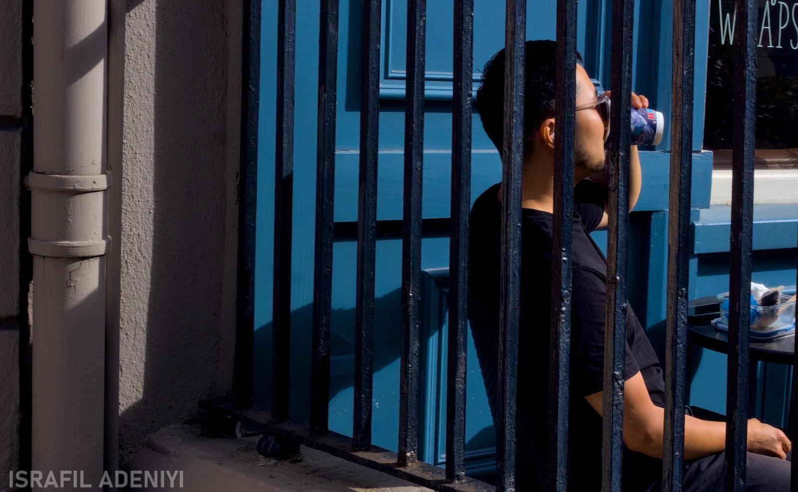 Man having a blue coffee